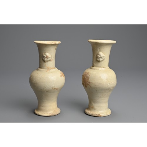 323 - A PAIR OF CHINESE QINGBAI WARE PORCELAIN VASES, SOUTHERN SONG DYNASTY (1127–1279). Each of baluster ... 