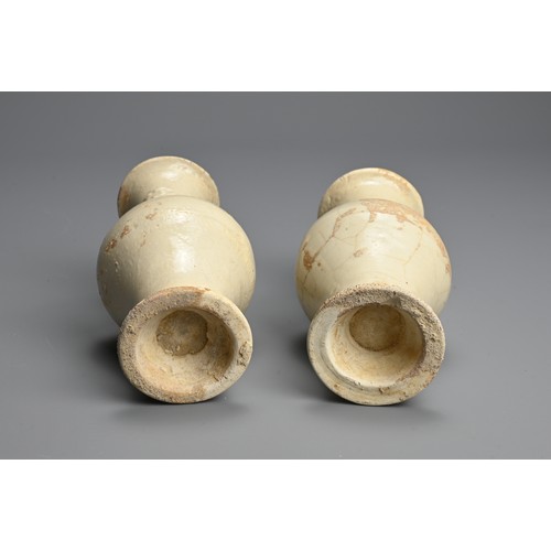 323 - A PAIR OF CHINESE QINGBAI WARE PORCELAIN VASES, SOUTHERN SONG DYNASTY (1127–1279). Each of baluster ... 