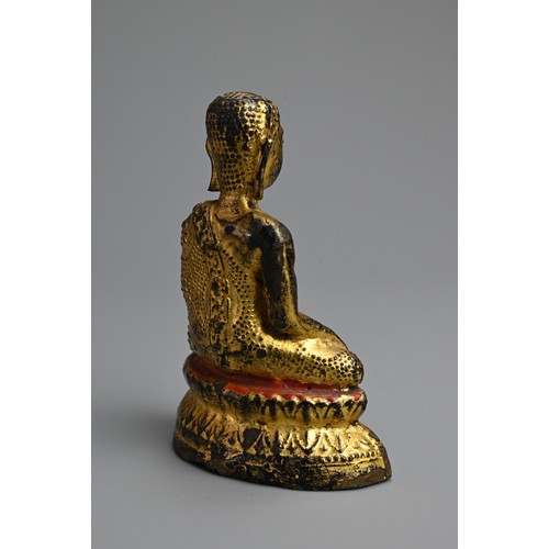 288 - A GOLD LACQUERED BRONZE FIGURE OF BUDDHA, 19TH CENTURY. Seated on a lotus base wearing a dhoti decor... 