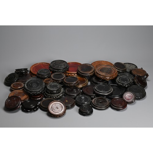 347 - A QUANTITY OF CHINESE WOOD DISPLAY STANDS, MAINLY 20TH CENTURY. All or circular form. Inner diameter... 