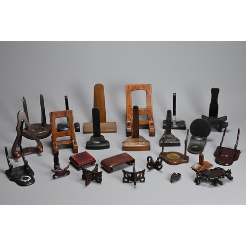 350 - A QUANTITY OF CHINESE WOOD DISPLAY STANDS. To include fifty eight folding plate stands, together wit... 