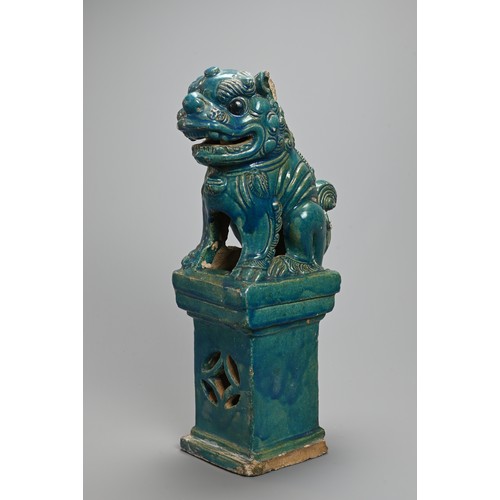 330 - A LARGE CHINESE TURQUOISE GLAZED STONEWARE GUARDIAN LION, MING / QING DYNASTY. The lion seated on a ... 