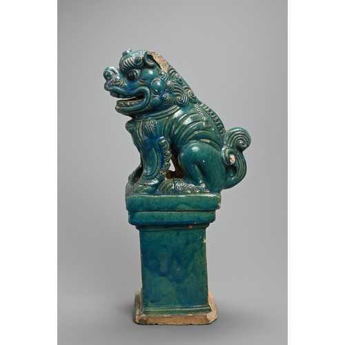 330 - A LARGE CHINESE TURQUOISE GLAZED STONEWARE GUARDIAN LION, MING / QING DYNASTY. The lion seated on a ... 