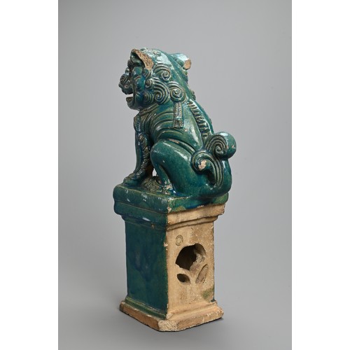 330 - A LARGE CHINESE TURQUOISE GLAZED STONEWARE GUARDIAN LION, MING / QING DYNASTY. The lion seated on a ... 