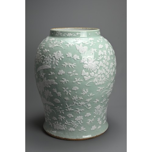 214 - A VERY LARGE CHINESE CELADON GROUND PORCELAIN VASE, EARLY TO MID 19TH CENTURY. Heavily potted of wid... 