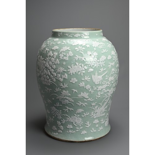 214 - A VERY LARGE CHINESE CELADON GROUND PORCELAIN VASE, EARLY TO MID 19TH CENTURY. Heavily potted of wid... 