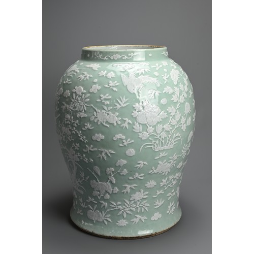 214 - A VERY LARGE CHINESE CELADON GROUND PORCELAIN VASE, EARLY TO MID 19TH CENTURY. Heavily potted of wid... 