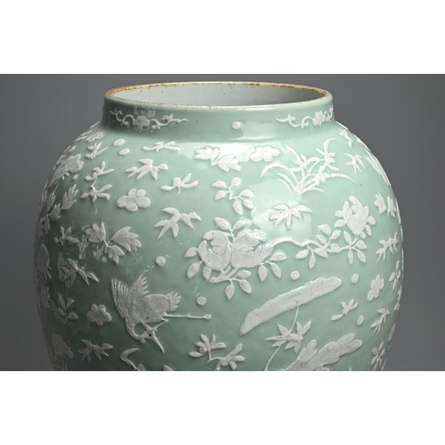 214 - A VERY LARGE CHINESE CELADON GROUND PORCELAIN VASE, EARLY TO MID 19TH CENTURY. Heavily potted of wid... 