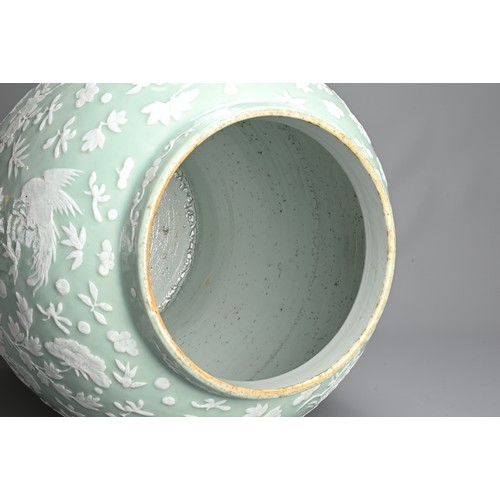 214 - A VERY LARGE CHINESE CELADON GROUND PORCELAIN VASE, EARLY TO MID 19TH CENTURY. Heavily potted of wid... 