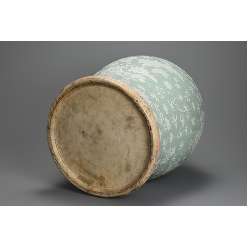 214 - A VERY LARGE CHINESE CELADON GROUND PORCELAIN VASE, EARLY TO MID 19TH CENTURY. Heavily potted of wid... 