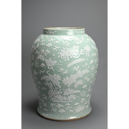 214 - A VERY LARGE CHINESE CELADON GROUND PORCELAIN VASE, EARLY TO MID 19TH CENTURY. Heavily potted of wid... 