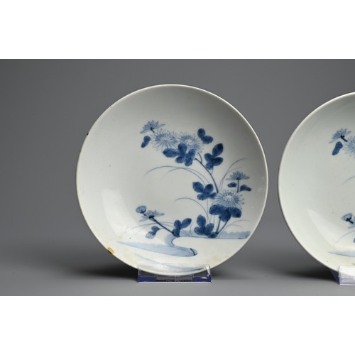 367 - A PAIR OF JAPANESE NABESHIMA BLUE AND WHITE PORCELAIN DISHES, 19TH CENTURY. Each painted with flower... 