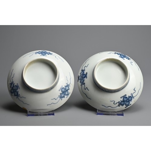 367 - A PAIR OF JAPANESE NABESHIMA BLUE AND WHITE PORCELAIN DISHES, 19TH CENTURY. Each painted with flower... 