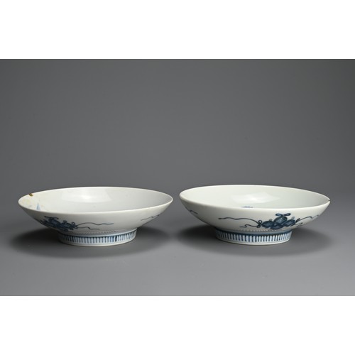 367 - A PAIR OF JAPANESE NABESHIMA BLUE AND WHITE PORCELAIN DISHES, 19TH CENTURY. Each painted with flower... 