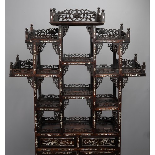 339 - A TALL CHINESE HARDWOOD INLAID DECORATED DISPLAY CABINET, EARLY 20TH CENTURY. In two sections compri... 