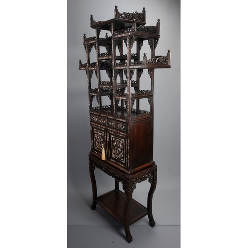 339 - A TALL CHINESE HARDWOOD INLAID DECORATED DISPLAY CABINET, EARLY 20TH CENTURY. In two sections compri... 