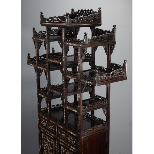 339 - A TALL CHINESE HARDWOOD INLAID DECORATED DISPLAY CABINET, EARLY 20TH CENTURY. In two sections compri... 