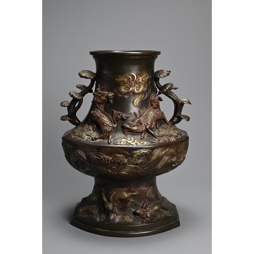 375 - A JAPANESE BRONZE TWO-HANDLED BALUSTER VASE, LATE MEIJI PERIOD (1868-1912). With pierced foliate han... 