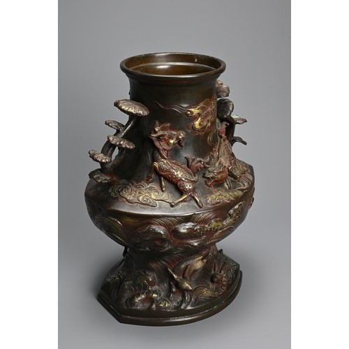 375 - A JAPANESE BRONZE TWO-HANDLED BALUSTER VASE, LATE MEIJI PERIOD (1868-1912). With pierced foliate han... 