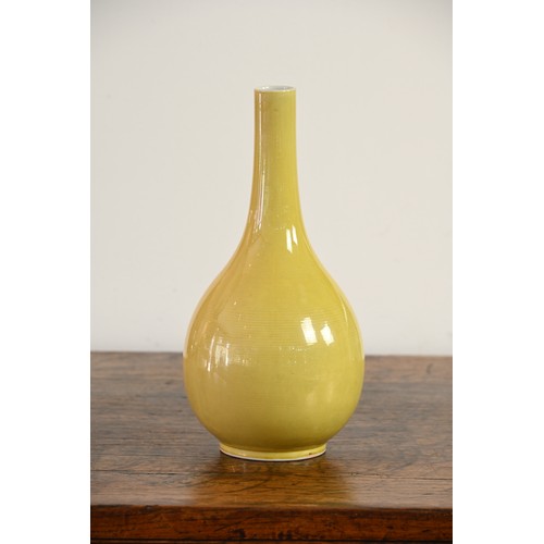 14 - A FINE CHINESE YELLOW GLAZED PORCELAIN BOTTLE VASE, REPUBLIC PERIOD. Of pear shape with cylindrical ... 