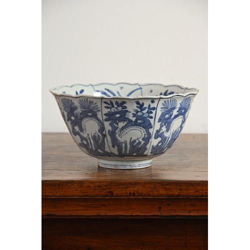 62 - A LARGE CHINESE BLUE AND WHITE PORCELAIN DEER BOWL, LATE MING DYNASTY. The bowl with deep rounded si... 