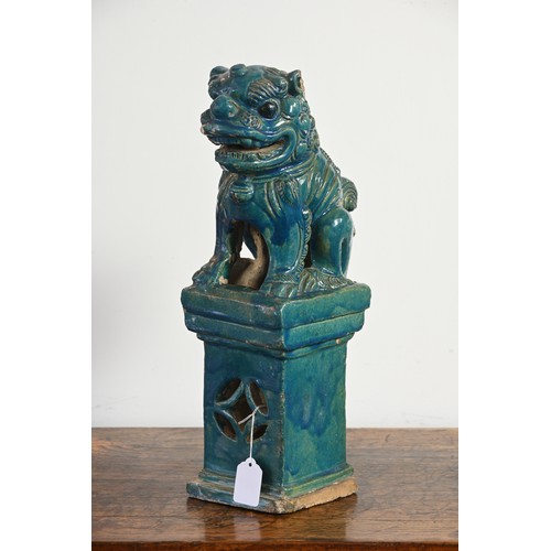 330 - A LARGE CHINESE TURQUOISE GLAZED STONEWARE GUARDIAN LION, MING / QING DYNASTY. The lion seated on a ... 