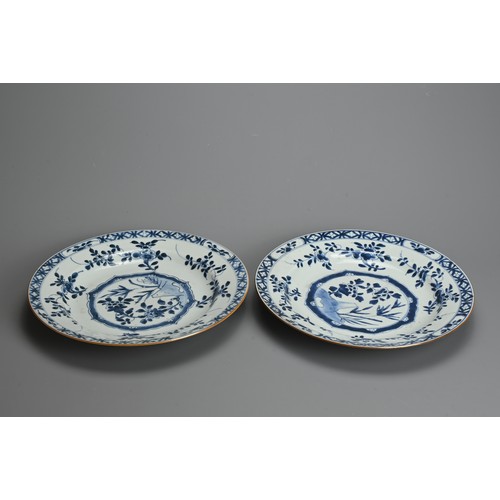 106 - A PAIR OF CHINESE BLUE AND WHITE PORCELAIN DISHES, 18TH CENTURY. Circular dishes decorated with cent... 