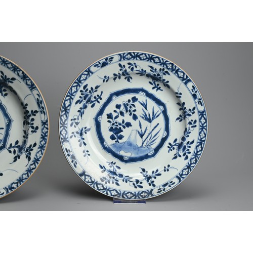 106 - A PAIR OF CHINESE BLUE AND WHITE PORCELAIN DISHES, 18TH CENTURY. Circular dishes decorated with cent... 