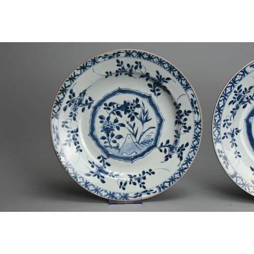 106 - A PAIR OF CHINESE BLUE AND WHITE PORCELAIN DISHES, 18TH CENTURY. Circular dishes decorated with cent... 