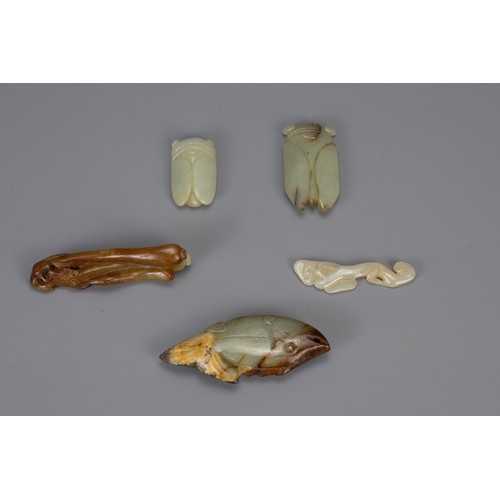 311 - FIVE CHINESE PALE CELADON ITEMS, of different forms to include cicadas, fish, lingzhi fungus and elo... 