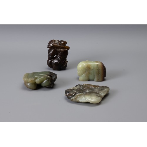 319 - FOUR CHINESE CARVED JADE ITEMS, of different forms to include Liu Hai, recumbent lion with butterfly... 