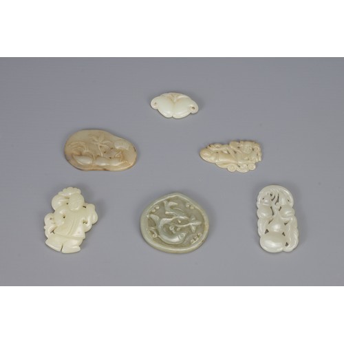 314 - SIX CHINESE CARVED PALE CELADON JADE PENDANTS, of different forms to include hanging double-gourds, ... 