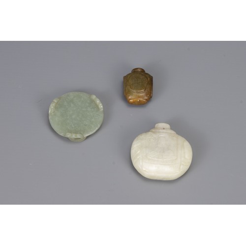 318 - THREE CHINESE CARVED JADE ITEMS, to include two snuff bottles and one brush washer in the form of a ... 