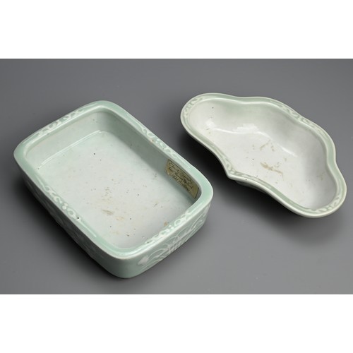 148 - TWO CHINESE SLIP DECORATED CELADON GROUND PORCELAIN NARCISSUS BOWLS, 19TH CENTURY. of lobbed and rec... 