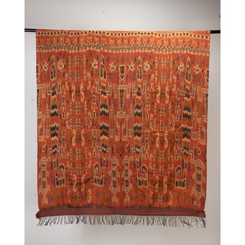 243 - TWO 20TH CENTURY INDONESIAN (SUMBA) COTTON IKAT HINGGI. Each woven with stylised reptiles and figure... 