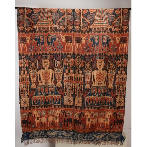 241 - TWO 20TH CENTURY INDONESIAN (SUMBA) COTTON IKAT HINGGI. The first woven with bands of figures, cattl... 