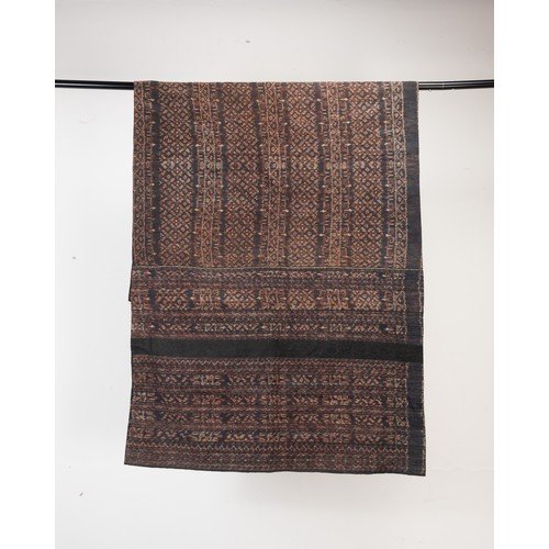 242 - A GROUP OF 20TH CENTURY INDONESIAN TEXTILES. Comprising: a small Sumba cotton ikat, woven with birds... 