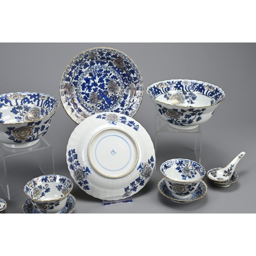 13 - A GROUP OF STRAITS CHINESE NYONYA BLUE AND WHITE GILT DECORATED PORCELAIN ITEMS, 19TH CENTURY. Twelv... 