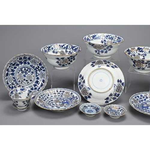 14 - A GROUP OF STRAITS CHINESE NYONYA BLUE AND WHITE GILT DECORATED PORCELAIN ITEMS, 19TH CENTURY. Thirt... 