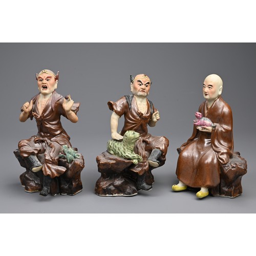 41 - A RARE SET OF CHINESE PAINTED AND ENAMELLED BISCUIT PORCELAIN LUOHAN FIGURES, ATTRIBUTED TO ZENG LON... 