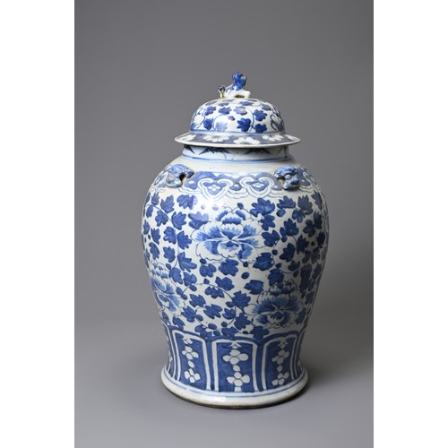 158 - A 19TH CENTURY CHINESE PORCELAIN BLUE AND WHITE BALUSTER VASE AND DOMED COVER. Decorated with flower... 