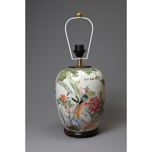 160 - A CHINESE PORCELAIN OVIFORM FAMILLE ROSE VASE. Painted with a pheasant and crane, before a peony and... 