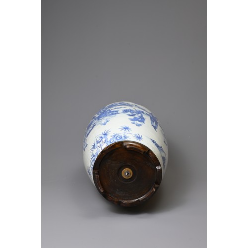 157 - A 20TH CENTURY CHINESE PORCELAIN BLUE AND WHITE OVIFORM VASE ADAPTED AS A LAMP. Painted in the Trans... 