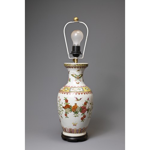 154 - A 20TH CENTURY CHINESE PORCELAIN OVIFORM FAMILLE ROSE VASE ADAPTED AS A LAMP. Painted with butterfli... 