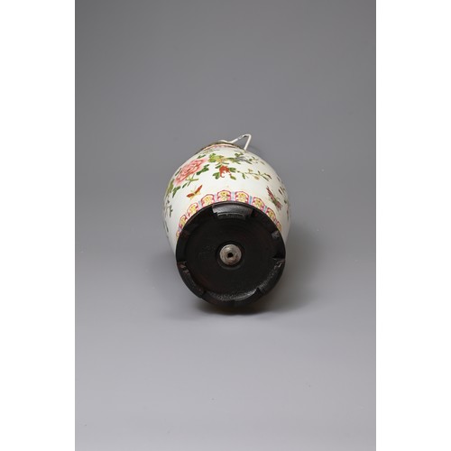 154 - A 20TH CENTURY CHINESE PORCELAIN OVIFORM FAMILLE ROSE VASE ADAPTED AS A LAMP. Painted with butterfli... 