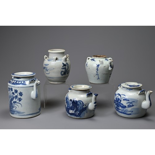 133 - FIVE CHINESE PORCELAIN BLUE AND WHITE TEAPOTS AND THREE COVERS, 19TH CENTURY. Comprising: a tall cyl... 