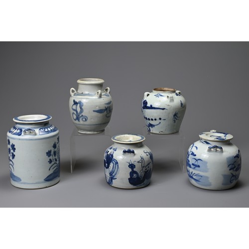 133 - FIVE CHINESE PORCELAIN BLUE AND WHITE TEAPOTS AND THREE COVERS, 19TH CENTURY. Comprising: a tall cyl... 