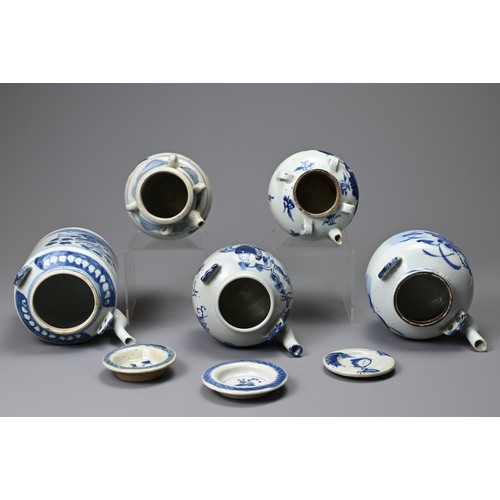 133 - FIVE CHINESE PORCELAIN BLUE AND WHITE TEAPOTS AND THREE COVERS, 19TH CENTURY. Comprising: a tall cyl... 