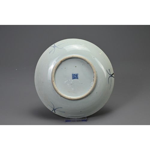 144 - TWO CHINESE PORCELAIN BLUE AND WHITE DISHES, QING DYNASTY, each with seal mark. The first painted wi... 