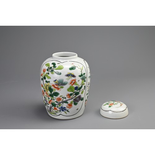 100 - A CHINESE FAMILLE VERTE PORCELAIN JAR AND COVER, EARLY 20TH CENTURY. Of ovoid form decorated with pa... 